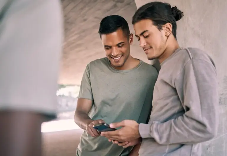 Sports, men and friends with smartphone, smile and connection with social media, communications and